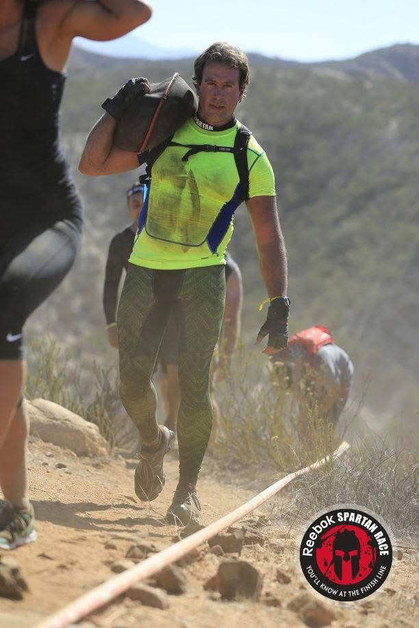 Dr. Roges competing in a Spartan Race